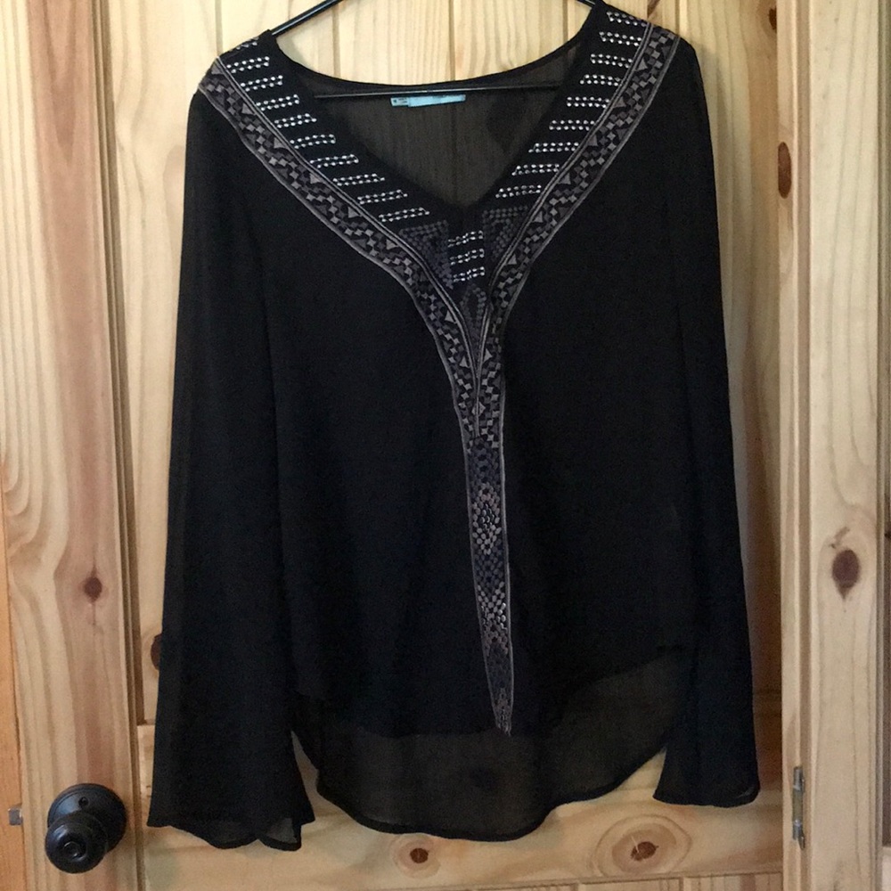 Sheer, light weight, long sleeve ladies blouse